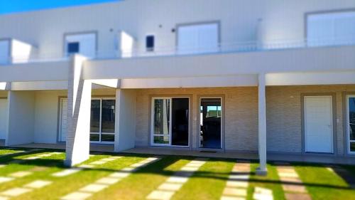 Фотография гостевого дома CASA EM CONDOMÍNIO - 3 dormitórios - LAZER COMPLETO - Xangri-lá