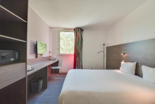 Фотография гостиницы Kyriad Aix Les Milles - Plan de Campagne