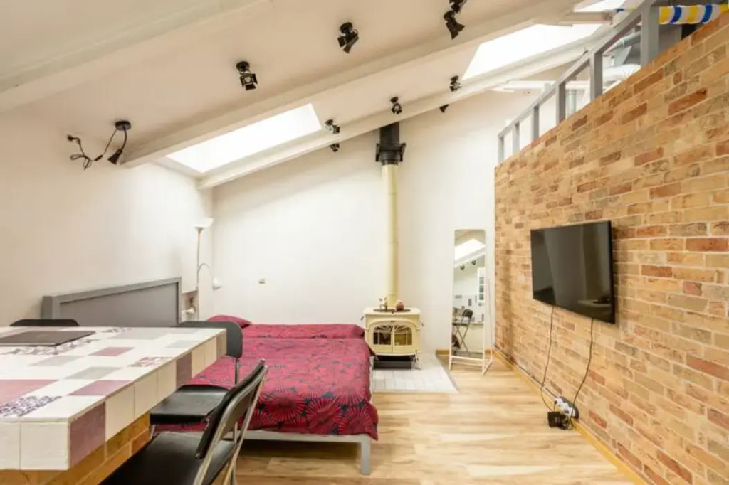 Фотография квартиры Apartments Лофт с Белым Камином