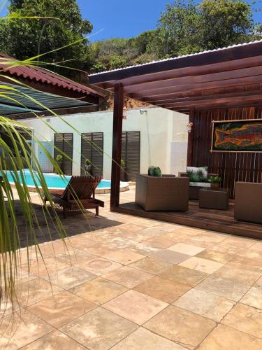 Фотография гостевого дома Aruanã Chalés