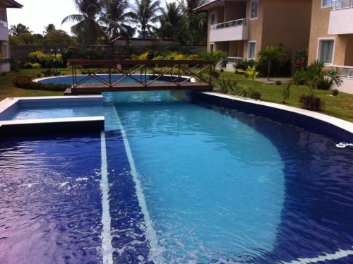 Фотография гостевого дома Village Guarajuba Verano Residencial Térreo C05 - área churrasqueira particular