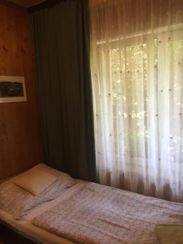 Фотография гостевого дома Donau Apartman,Tát