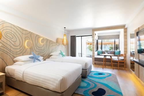 Фотография гостиницы LIV Hotel Phuket Patong Beachfront - SHA Extra Plus