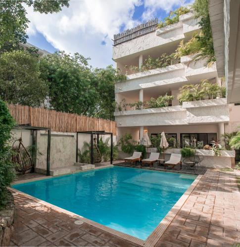 Фотография гостиницы Che Suites Tulum Adults Only