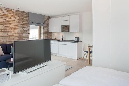 Фотография квартиры 2,5 Zi Design Loft Wohnung mit Gartensitzplatz