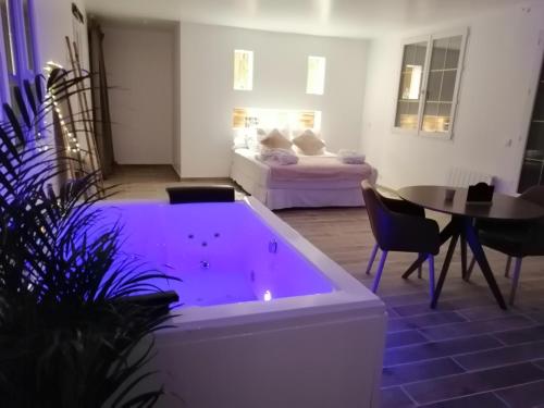 Фотография гостевого дома L'évasion romantique Appart Spa 95