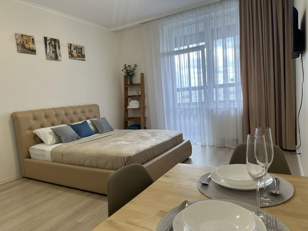 Фотография квартиры Квартира Просторная уютная и современная студия на Родонитовой 35