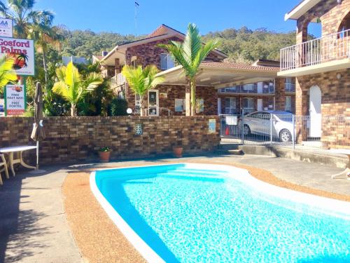 Фотография мотеля Gosford Palms Motor Inn
