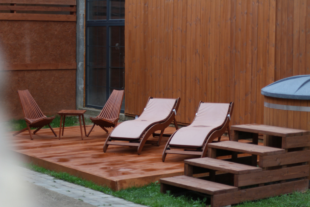 Фотография Коттеджа Частный дом Уютный с купелью, сауной и камином Лаундж с гамаком и лежаками