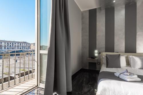 Фотография гостиницы Bella Napoli Suites