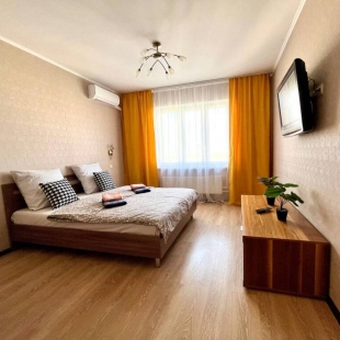 Фотография квартиры Апартаменты Уютная Квартира Вместимостью до 4 Человек с Кондиционером и балконом