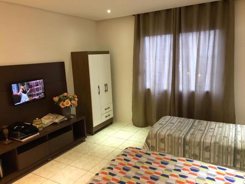 Фотографии апарт отеля 
            Travessa 12 - Suítes centro de Serra Negra