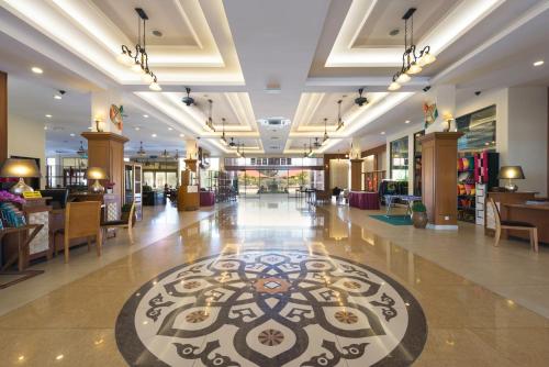 Фотография гостиницы Tok Aman Bali Beach Resort @ Beachfront