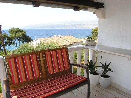 Фотография гостевого дома Apartments with a parking space Postira, Brac - 11428