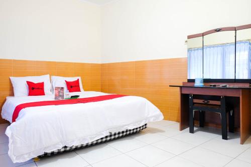 Фотография гостевого дома RedDoorz near STAB Syailendra Kopeng