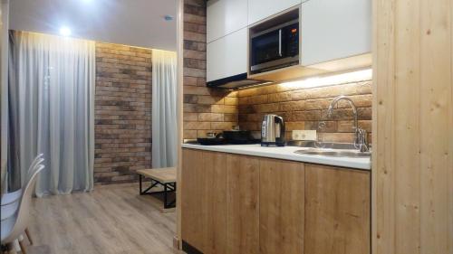 Фотография апарт отеля ORBI Palace Deluxe Bakuriani Apartment # 310