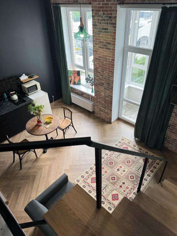 Фотография квартиры Апартаменты Дизайнерская двухуровневая квартира