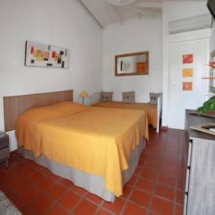 Фотографии гостиницы
Hôtel Les Bananiers