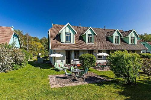 Фотография гостевого дома Ferienhaussiedlung Strandperlen Küstenhof 2a (Typ IV)