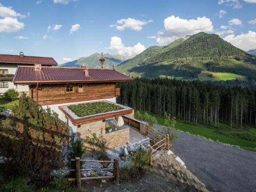 Фотография гостевого дома Rossberg Hohe Tauern Chalets -8