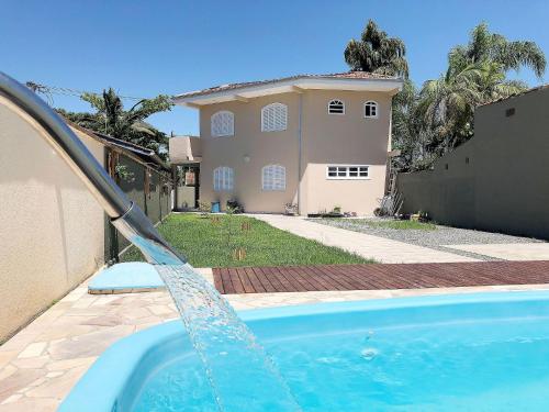 Фотографии гостевого дома
Maravilhoso sobrado com piscina, CASCATA!