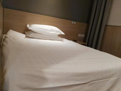 Фотография гостиницы Hi Inn Shanghai Xinzhuang Underground Station