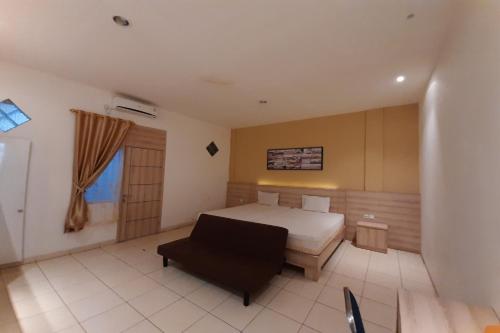 Фотография гостиницы SPOT ON 2869 Ionia Homestay