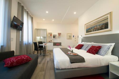 Фотографии гостевого дома 
            Monza City Rooms & Studios