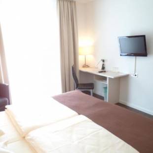 Фотографии гостиницы 
            Das Neue Hotel Am Park