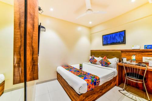 Фотография гостиницы FabExpress Deluxe Comfort