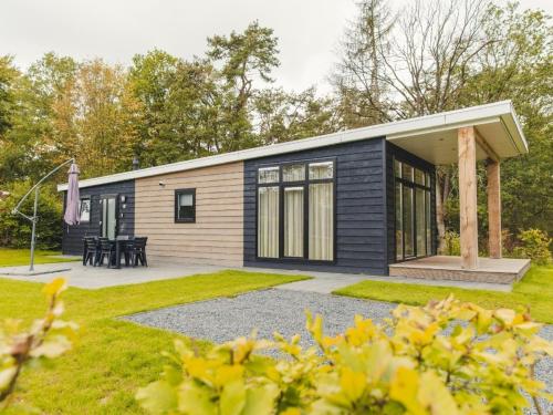 Фотография гостевого дома Cozy chalet with garden, at the edge of the forest