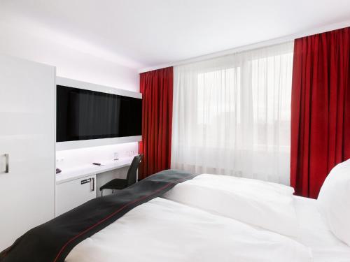 Фотография гостиницы DORMERO Hotel Hannover-Langenhagen Airport