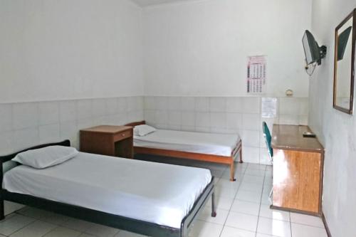 Фотография гостиницы SPOT ON 2865 Sartika Inn Pati