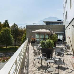 Фотографии гостиницы 
            Okko Hotels Grenoble Jardin Hoche