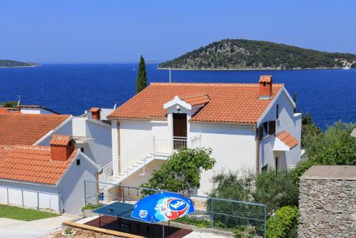 Фотография гостевого дома Family friendly seaside apartments Razanj, Rogoznica - 10373