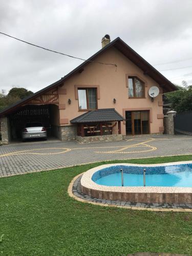 Фотография гостевого дома На Черемшины, 27а