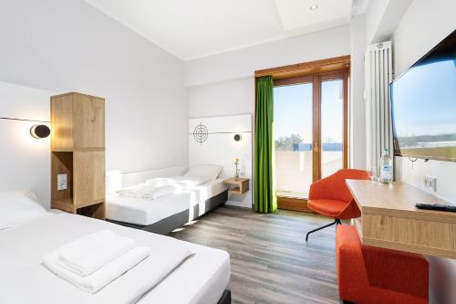 Фотография гостиницы Hotel Olympia Schießanlage