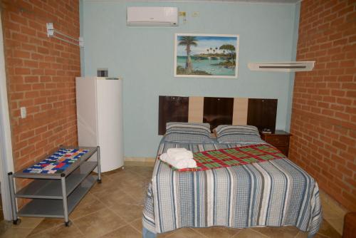 Фотография гостевого дома Duas suítes no centro