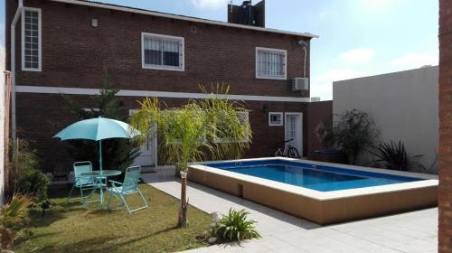 Фотография гостевого дома Casa Con Pileta En Roldan