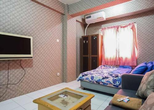 Фотография гостиницы OYO 91025 Rendy Pelangi Rooms Citypark