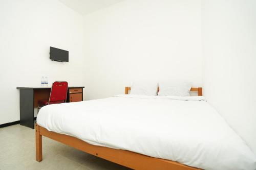 Фотография гостиницы Merapi Inn Surabaya by ecommerceloka