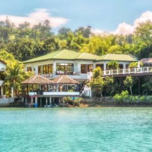 Фотография гостиницы Edgewater Dive & Spa Resort