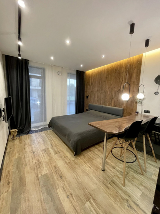 Фотографии квартиры 
            Апартаменты Охта Adventure Rustic