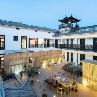 Фотографии гостиницы 
            Lijiang Gemmer Hotel