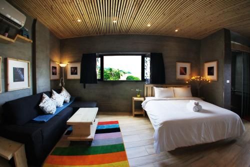 Фотография мини отеля 鄰近沙灘 國旅卡特約 另有包棟 船帆石原宿