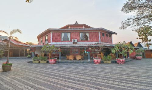 Фотография гостиницы Treebo Tryst Blue Mountain Country Club And Resort