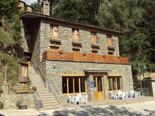 Фотография гостевого дома Hostal Les Roquetes