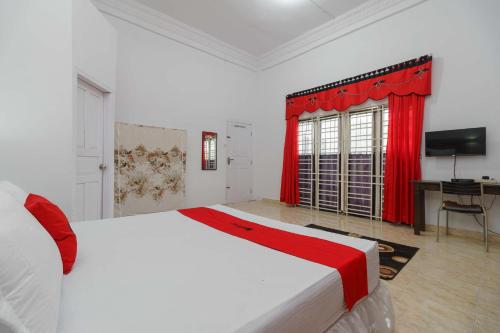 Фотография гостевого дома RedDoorz @ Binjai