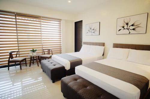 Фотография гостиницы Artemis Place Makati Hotel