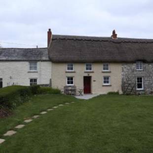 Фотографии гостевого дома 
            Cornish Thatched Cottage